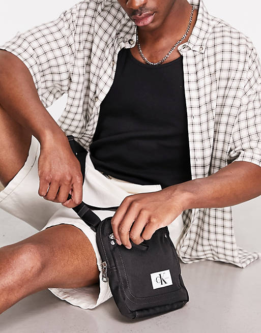 Calvin Klein Jeans sport essentials reporter bag in black | ASOS