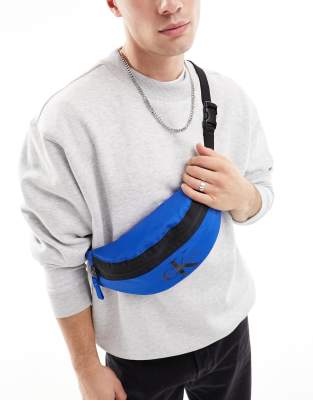Calvin Klein Jeans sport essentials waistbag in blue - ASOS Price Checker