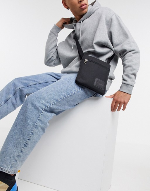 Calvin Klein Jeans Sports Essentials logo flight bag in black