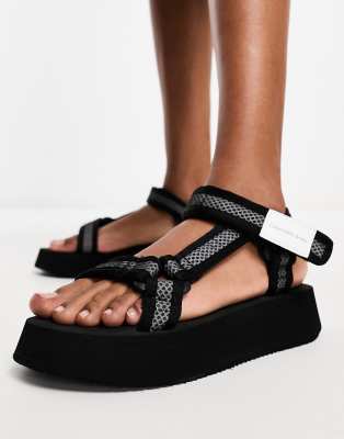 Calvin Klein Jeans strappy sandals in black