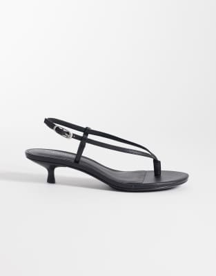 Calvin Klein Jeans strappy slingback leather flip flop heeled sandals in black