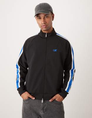 stripe track jacket in black and blue