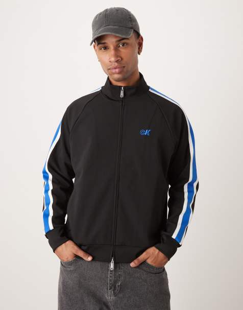 Calvin Klein Jeans stripe track jacket in black and blue - view 1