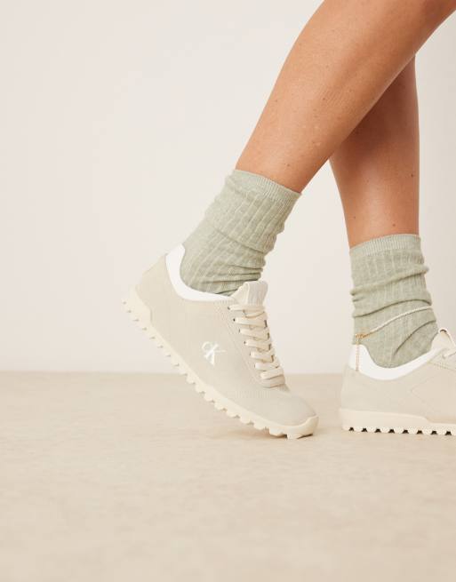 Calvin Klein Jeans suede low profile runner trainers in beige ASOS