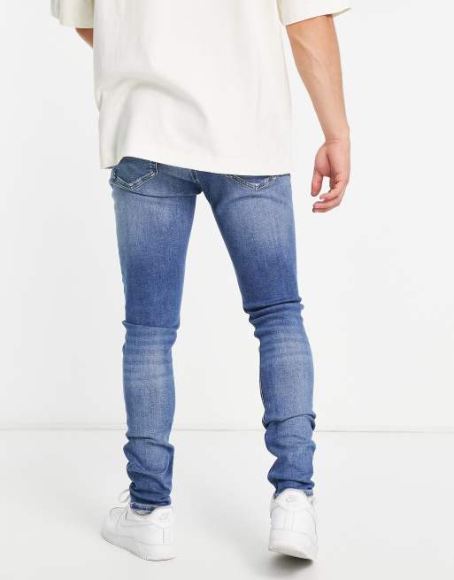 Erge, ernstige Delegeren Tablet Calvin Klein Jeans super skinny fit jeans in mid wash | ASOS