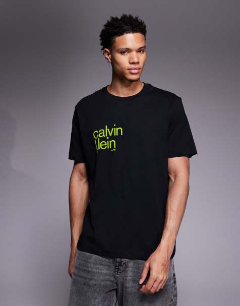 Calvin Klein Jeans – Svart och limegrön t-shirt med runt tryck baktill - view 1