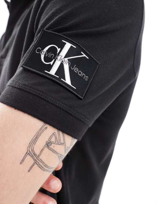 Calvin Klein Jeans – Svart pikétröja med påsydd logga, 3 av 4