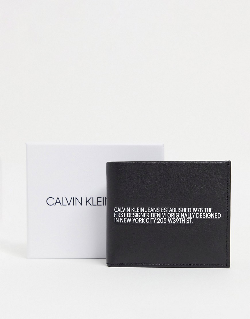 Calvin Klein Jeans – Svart vikbar plånbok i läder med myntficka och textlogga