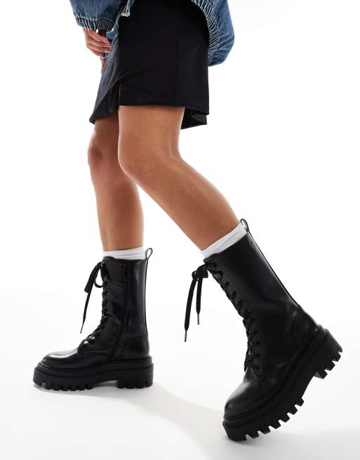 Calvin Klein Jeans – Svarta boots i flatform-design med snörning 