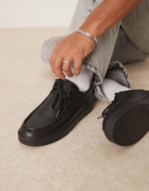 Calvin Klein Jeans – Svarta sneakers i läder med snörning