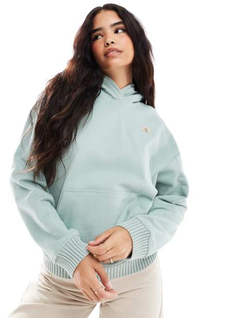 Calvin Klein Jeans - Sweat à capuche en coton éponge - Jadéite