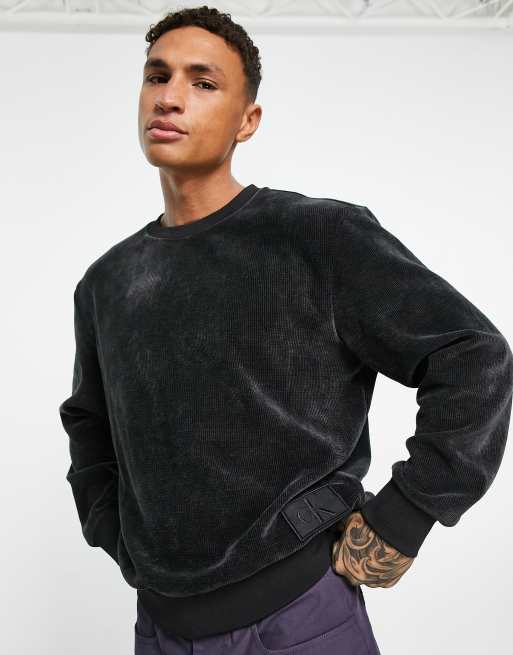 Calvin Klein Jeans – Sweatshirt aus Cord in Schwarz mit Logo