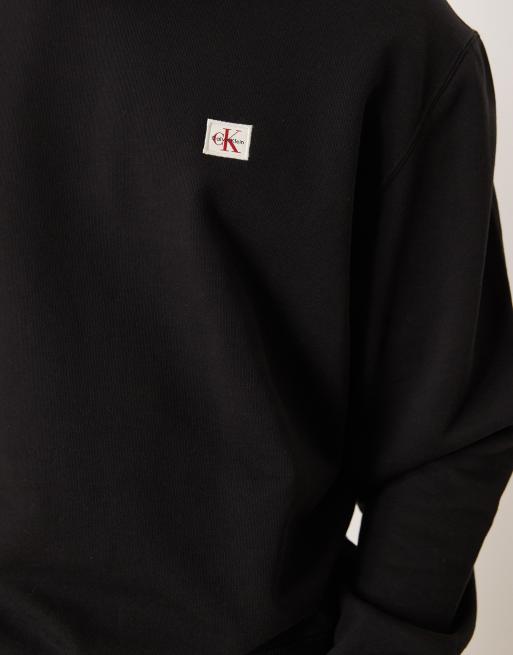 Calvin Klein Jeans – Sweatshirt in Schwarz mit Logoaufnäher , 5 von 5