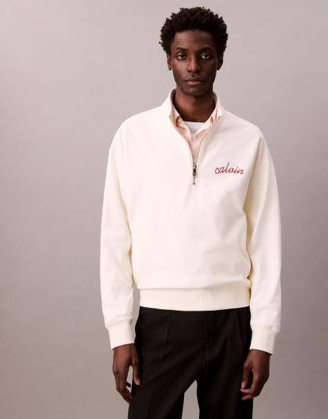 Calvin Klein Jeans - Sweatshirt met geborduurd logo op de borst en 1/4 rits in gebroken wit - view 1
