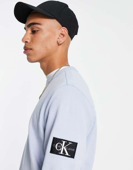 Calvin Klein Jeans - Sweatshirt met monogram-badge in lichtblauw