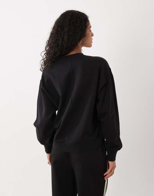 Calvin Klein Jeans Sweatshirt mit gewebtem Label, langen Ärmeln und V-Ausschnitt in Schwarz, 4 von 4