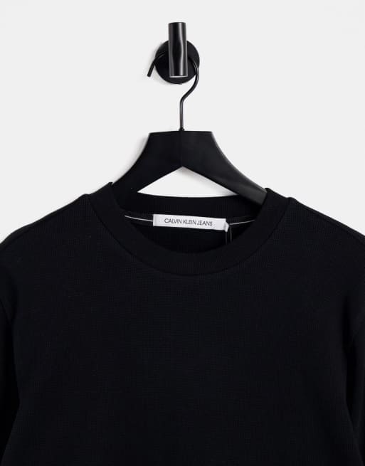 Calvin Klein Jeans - T-Shirt a maniche lunghe in piqué con stemma con monogramma, colore nero, 2 di 4