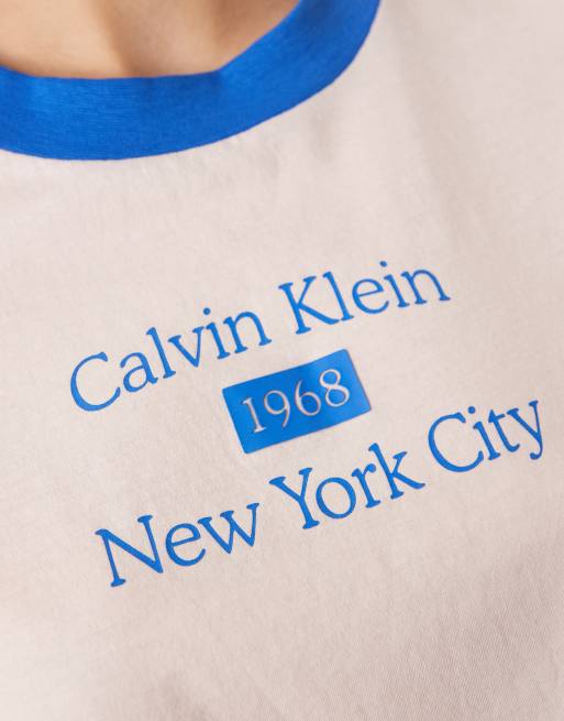 Calvin Klein Jeans - T-shirt baby rosa con bordi blu, 3 di 4