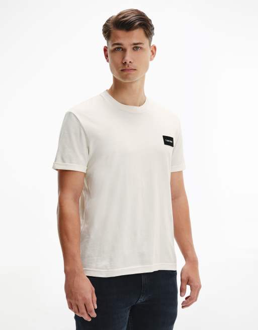 Calvin Klein Jeans - T-shirt con maniche con risvolto color crema con stemma con logo