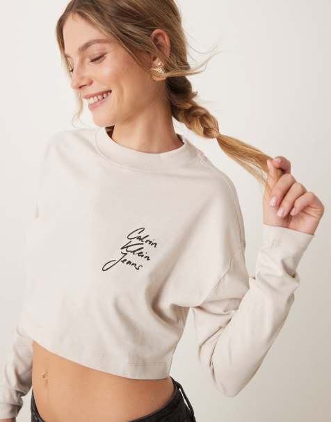 Calvin Klein Jeans - T-shirt crop top à manches longues et logo manuscrit - Beige - view 1