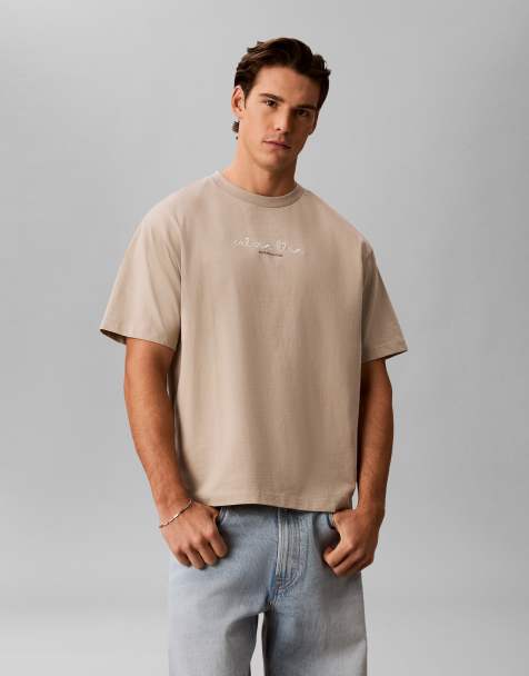 Calvin Klein Jeans – T-Shirt in Beige mit mittigem Schriftzug - view 1