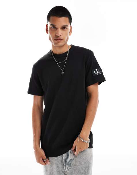 Calvin Klein Jeans – T-Shirt in Schwarz mit Waffelmuster und Aufnäher - view 1