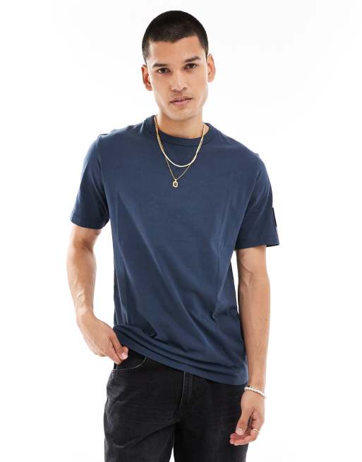 Calvin Klein Jeans - T-shirt met badge in marineblauw