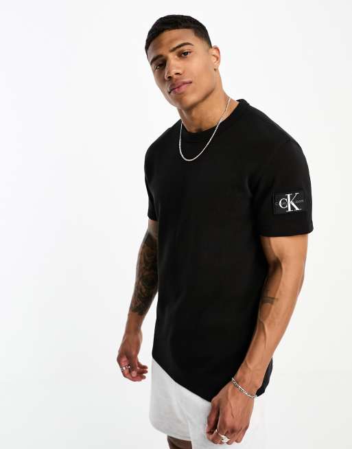 Calvin Klein Jeans - T-shirt met korte mouwen, badge-logo en wafeltextuur in zwart