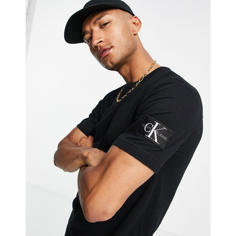  Designer Calvin Klein Jeans - T-shirt nera con stemma monogramma