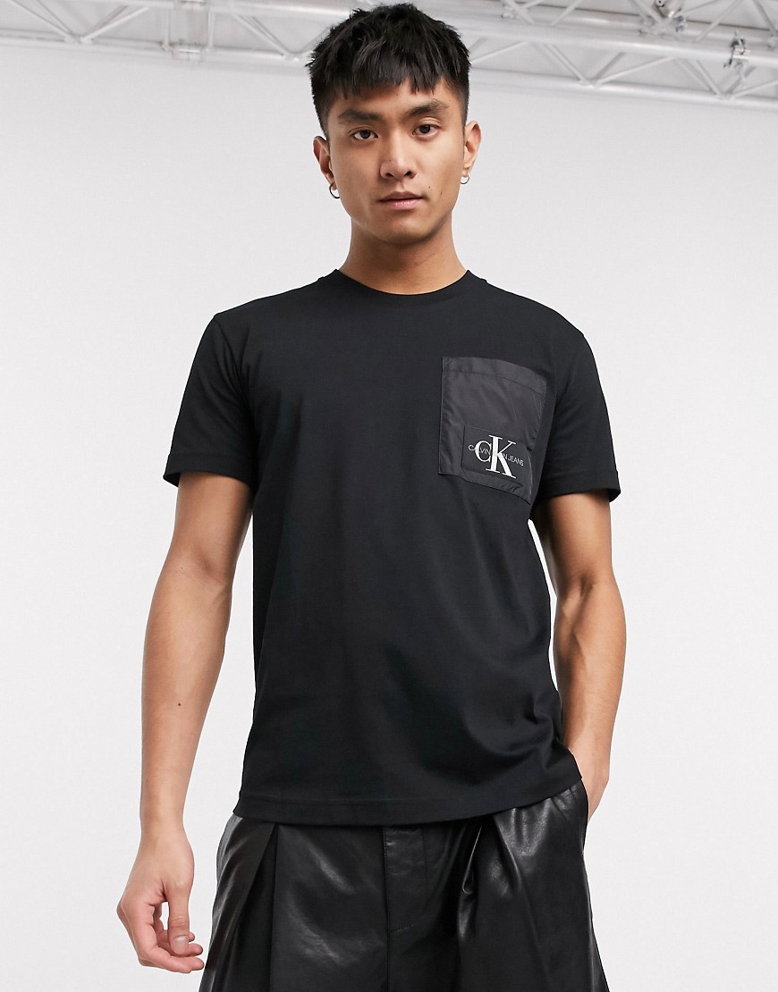 Calvin Klein Jeans - T-shirt nera con tasca a contrasto con logo-Nero