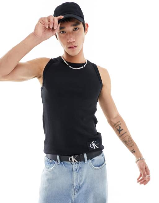 Calvin Klein Jeans – Tanktop in Schwarz mit Aufnäher und Waffelstruktur