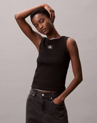 Calvin Klein Jeans - Tanktop in Schwarz mit Logo-Aufnäher