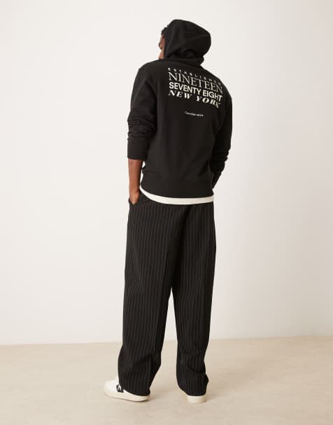 Calvin Klein Jeans text backprint hoodie in black - view 1