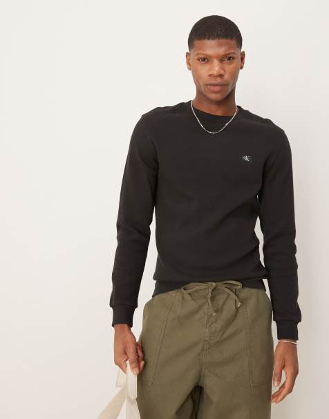 Calvin Klein Jeans - Top a maniche lunghe nero a nido d'ape con etichetta cucita - view 1