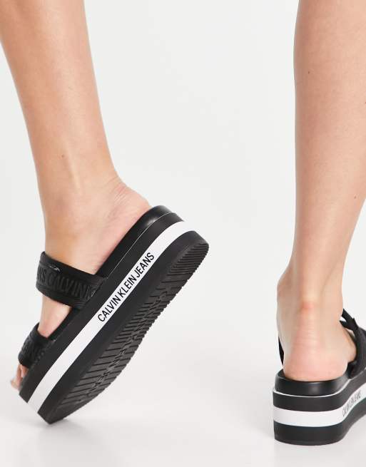 Calvin Klein Jeans two strap wedge sandal in black | ASOS