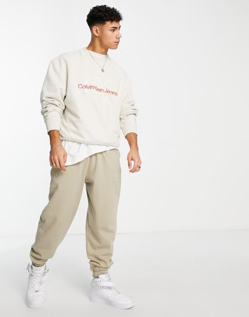 Calvin Klein Jeans relaxed fit sweatshirt in cream with monogram