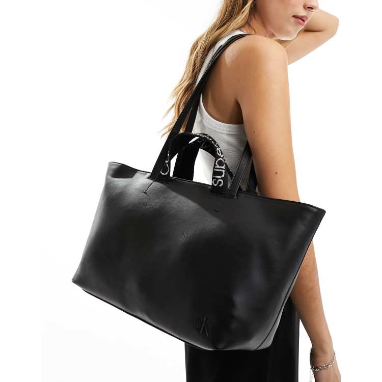 Calvin klein black discount leather tote bag