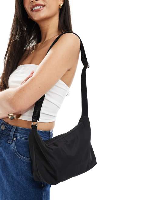 Calvin klein ultra light flap shoulder bag hotsell