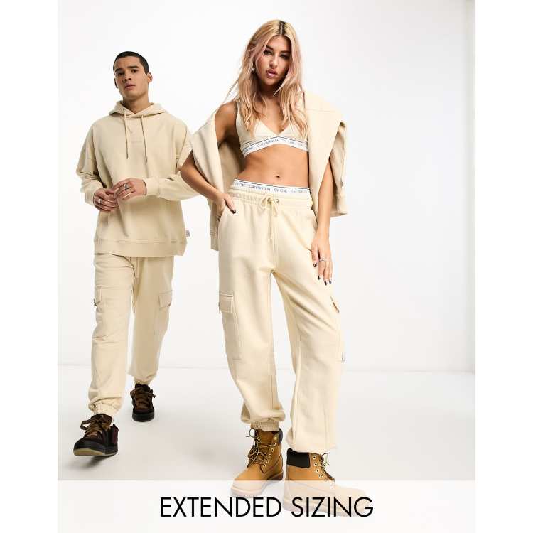 Calvin Klein Jeans unisex beige cargo ASOS to exclusive in - | sweatpants ASOS