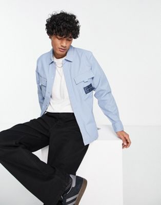 Calvin Klein Jeans utility cargo relaxed fit overshirt in light blue - ASOS Price Checker