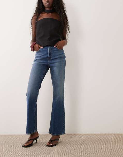 Calvin Klein Jeans - vaqueros bootcut de talle alto en azul lavado medio - view 1