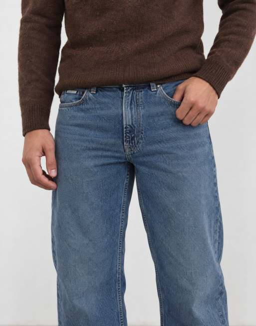 Calvin Klein Jeans - Vaqueros de pernera recta holgada con lavado azul medio, 12 de 13