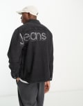 [Calvin Klein Jeans] Calvin Klein Jeans vertical bold logo overshirt in black XS Black