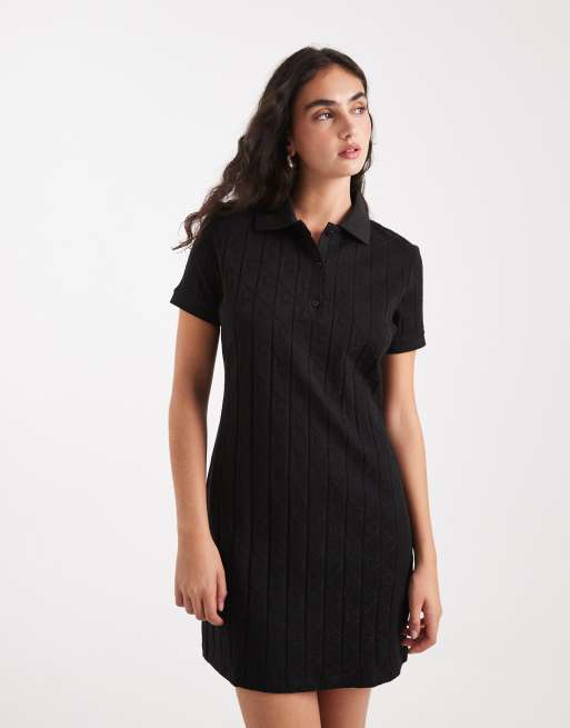 Calvin Klein Jeans - Vestito corto stile polo nero jacquard con stemma, 2 di 4