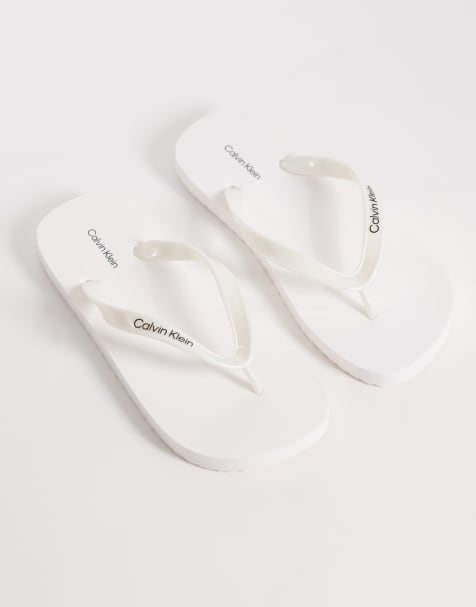 Calvin Klein Jeans – Vita, metalliska flip flops - view 1