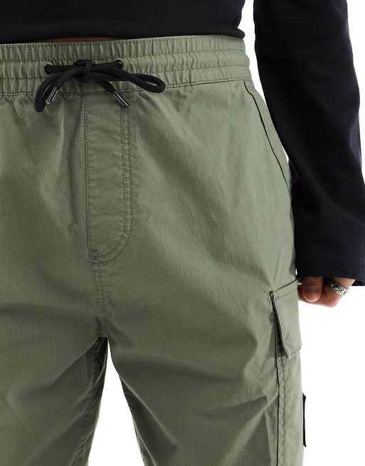 Calvin Klein Jeans washed cargo shorts in olive green ASOS