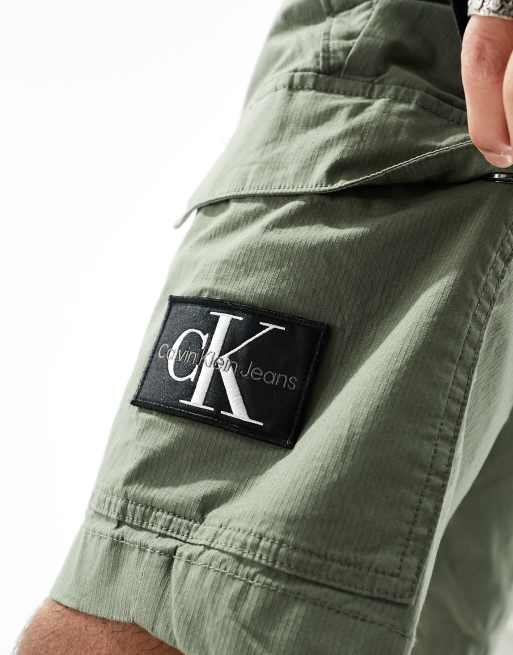 Calvin Klein Jeans washed cargo shorts in olive green ASOS