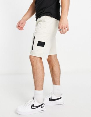 Calvin Klein Jeans washed cargo shorts with zip detail in stone - ASOS Price Checker