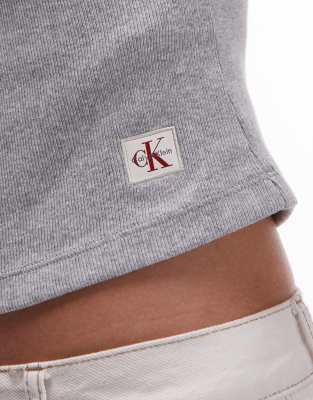 Calvin Klein Jeans Est.1978 Woven Label Cropped Sleeveless 1/4 Zip Top In Gray