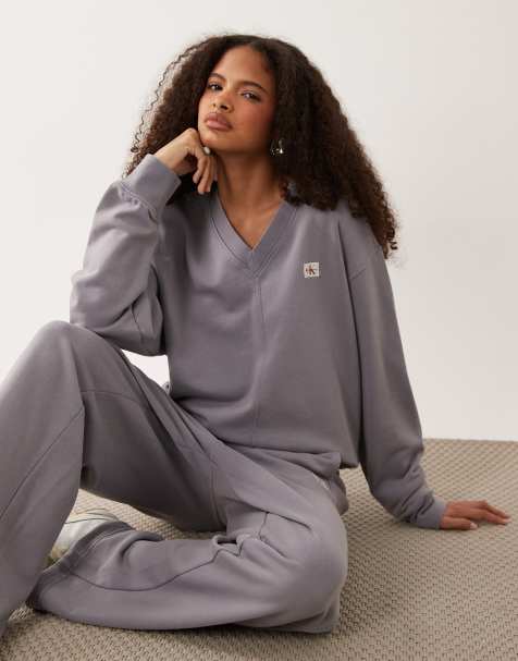 Calvin Klein Jeans Woven Label French Terry long sleeve v neck sweatshirt in lilac grey - view 1